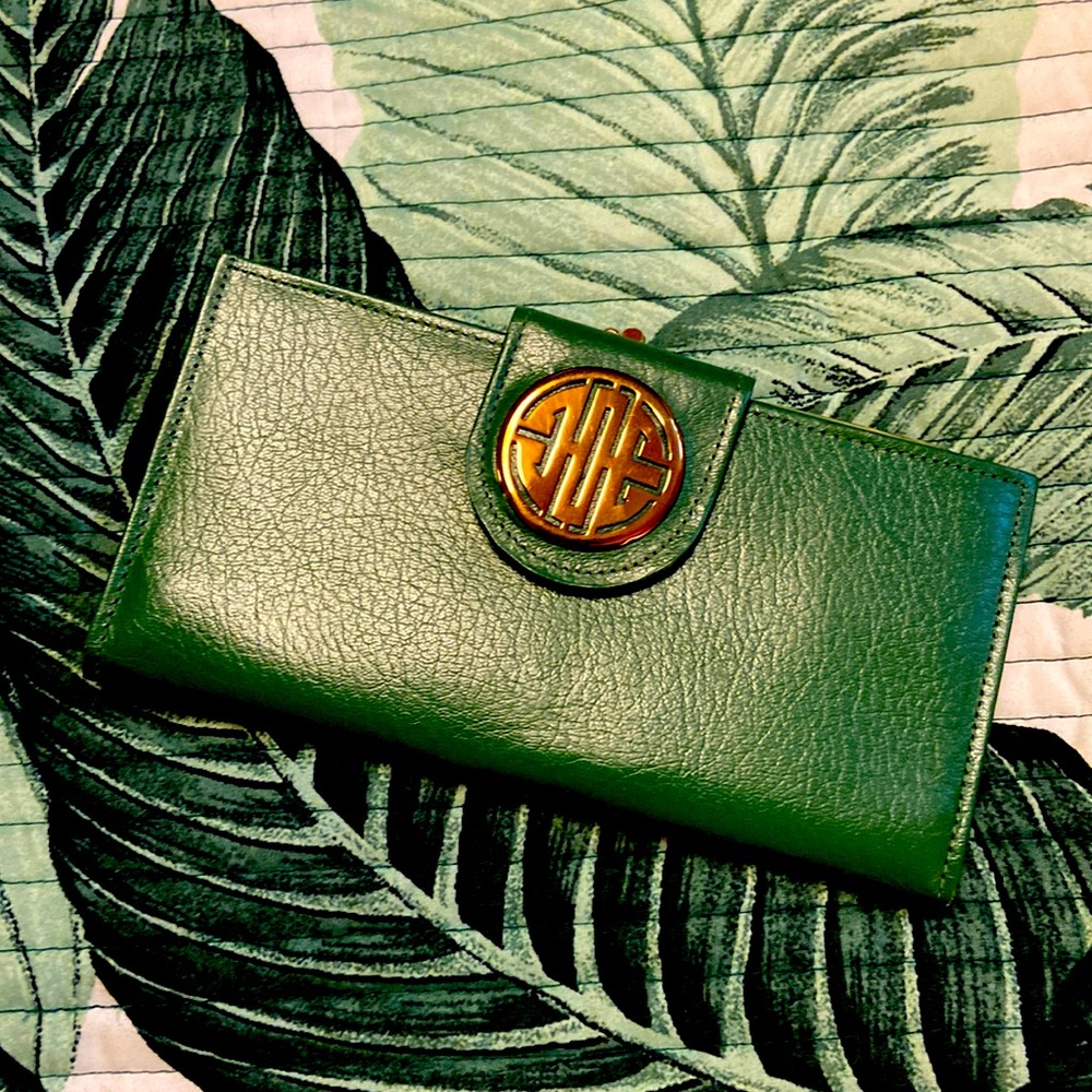 Vintage green wallet with gold medallion